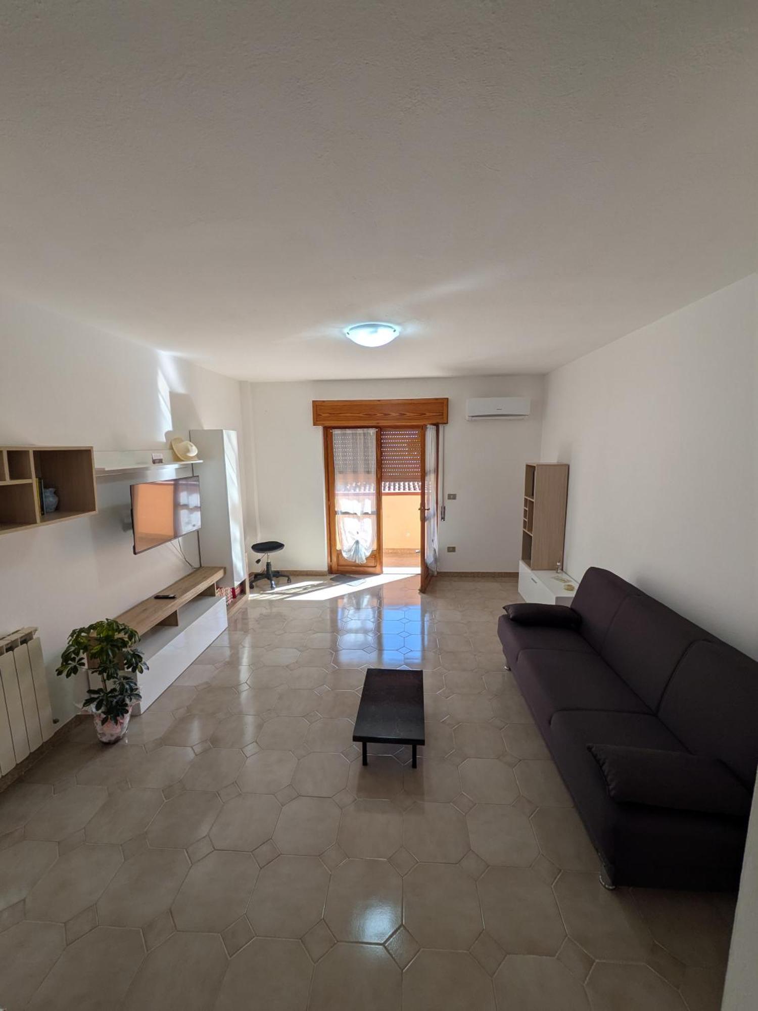 House Riky Apartment Assemini Bagian luar foto